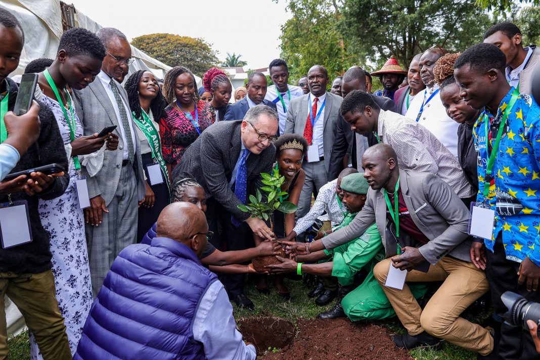 Delegates Planting a tree at the Kenya School of Government during the Climate Action Summit